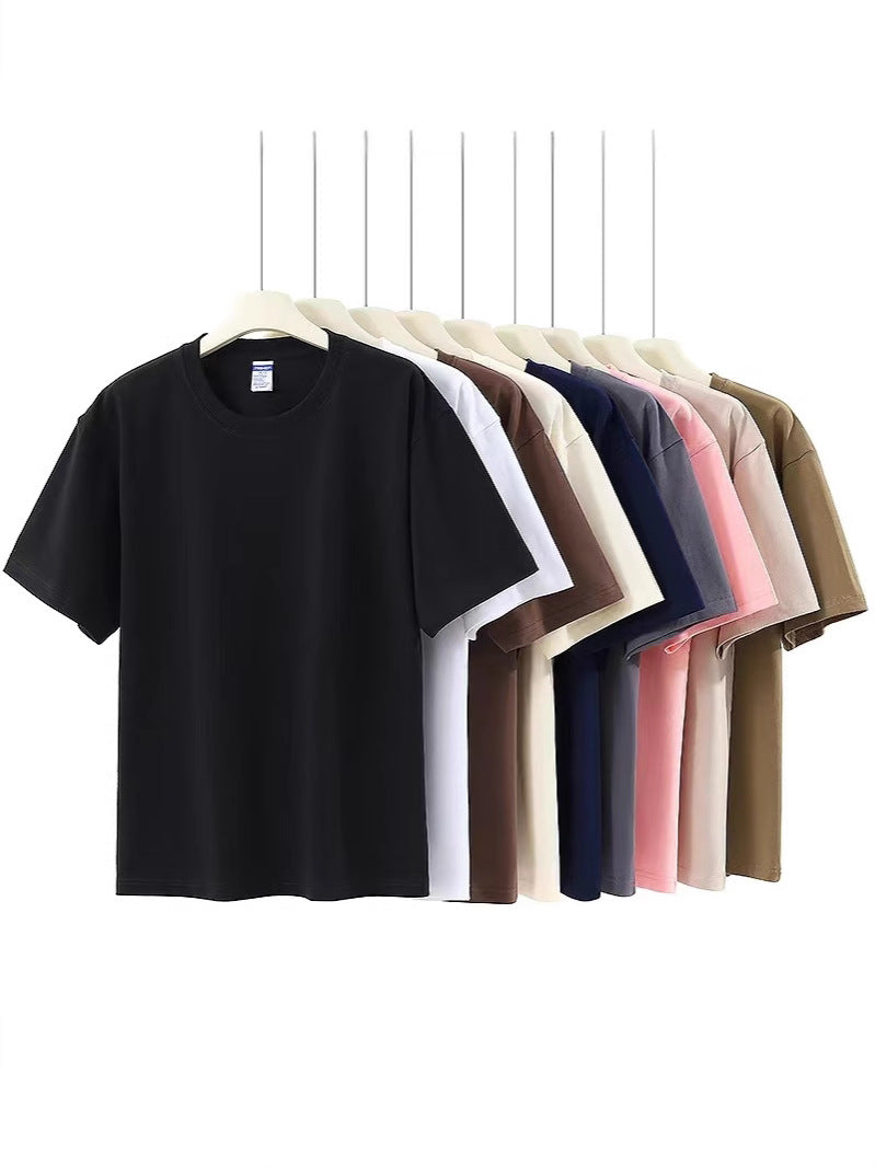 Camisetas de algodon puro de manga corta y cuello redondo con mangas holgadas para hombre y mujer.